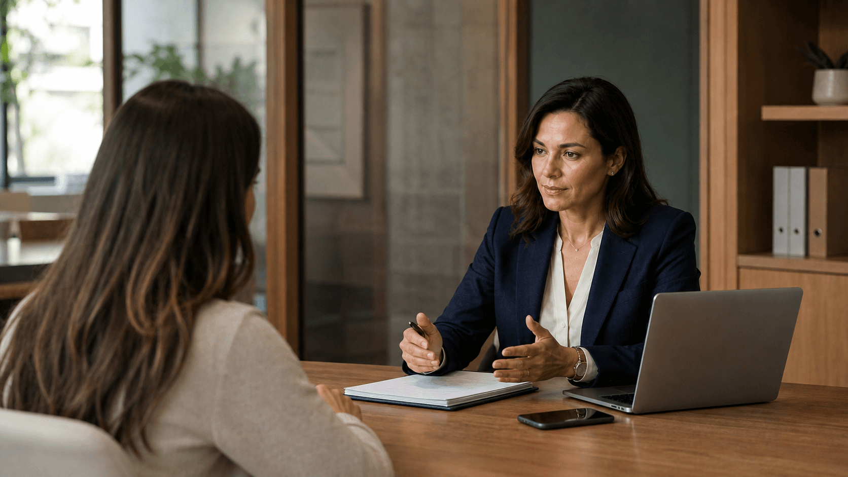 Female tax professional giving a client her full attention while her AI Front Desk handles interruptions